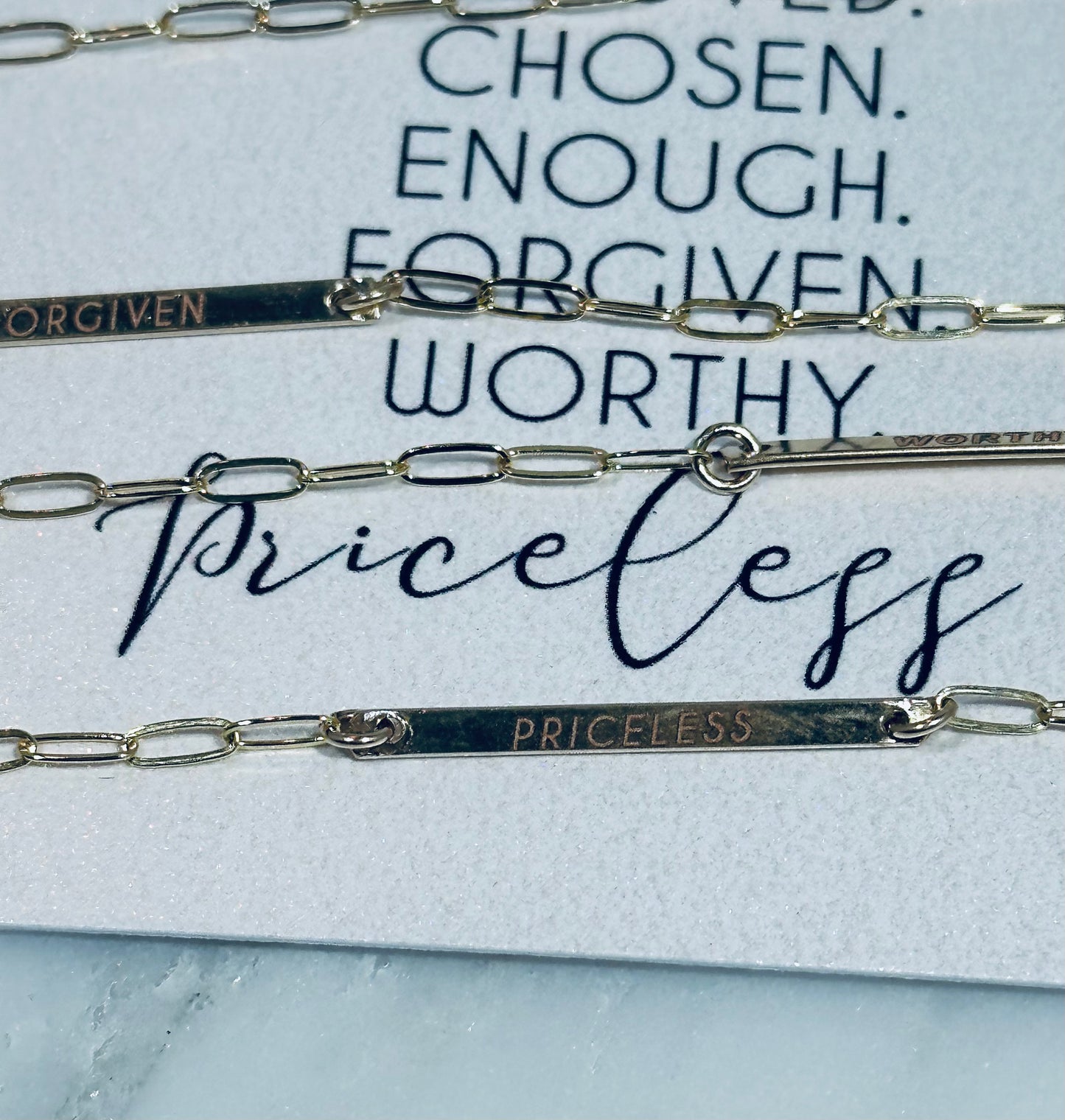 "PRICELESS,” Gold Limited Edition Plain Solid Bar with AAA CZ dangle.
