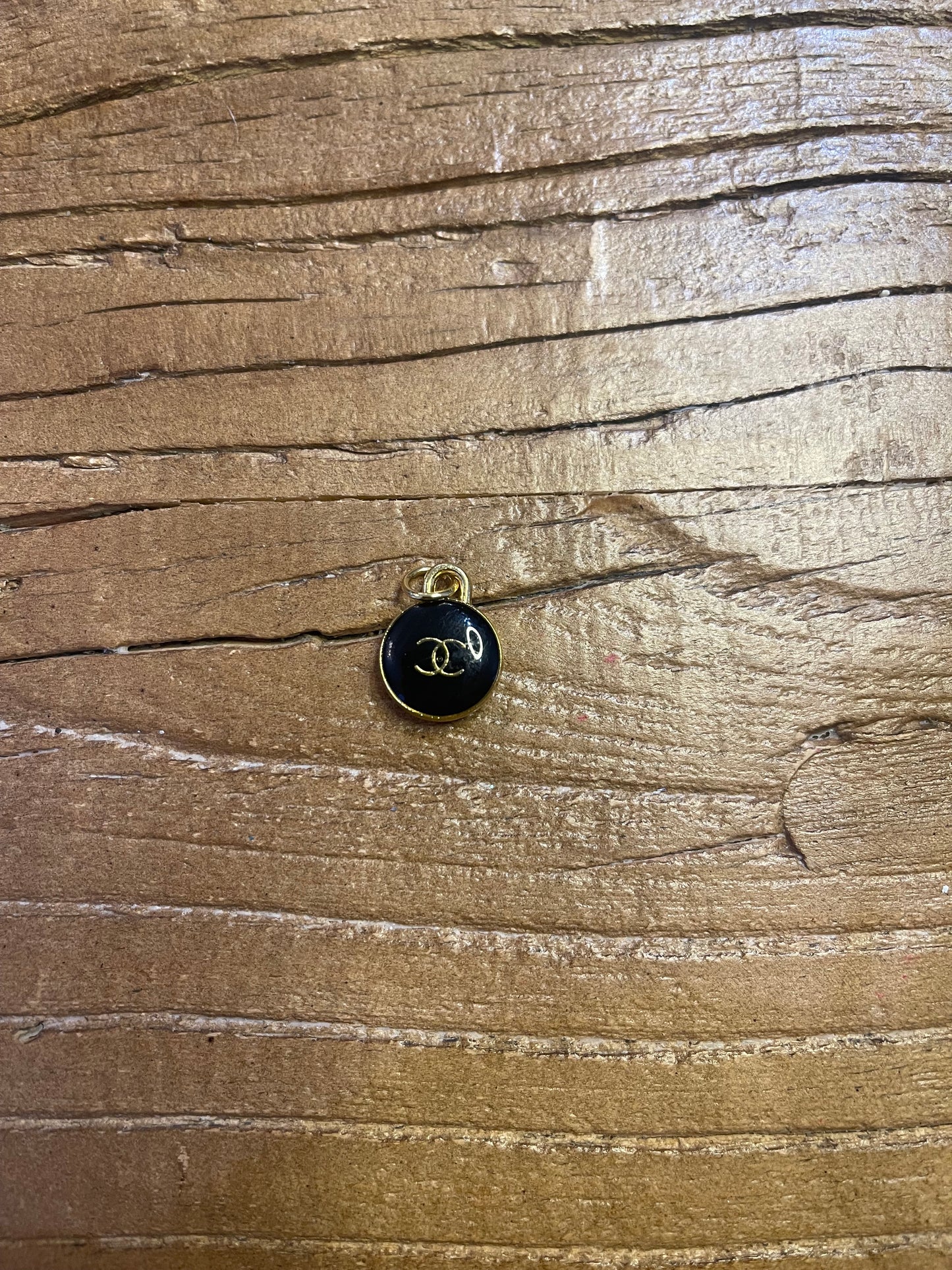 Chanel circle black CC pendant