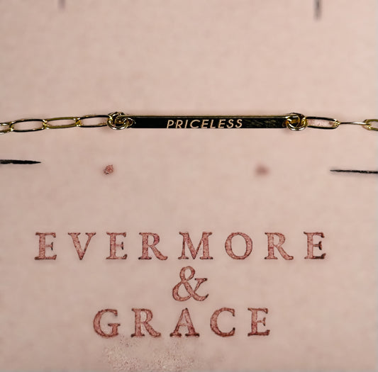 "PRICELESS,” Gold Limited Edition Plain Solid Bar with AAA CZ dangle.